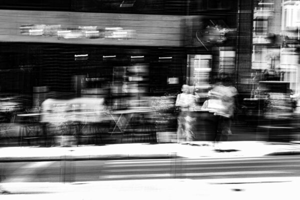 Abstract photography. Deliberately shaken, out of focus, blurred, inconsistently exposed. Creative digitally processed street photography.