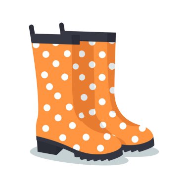 Beyaz noktalı bir çift turuncu çizme.