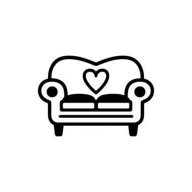 Siyah ikon, üzerinde kalp şeklinde bir yastık olan minimalist bir kanepe sergiliyor. Beyaz arka plana yerleştirilmiş sevgi ve konforun sembolü olarak..