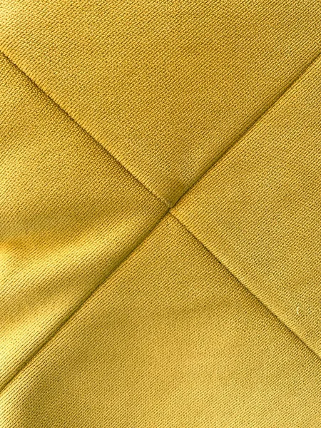 Sarı tekstil kumaş dokusu soyut moda kumaşı lüks model.