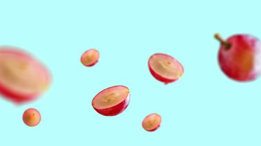 Reklam videosu için kırmızı üzüm dilimi görüntüsü. Düşen animasyon. Reklam videosu için. Meyve Görüntüsü