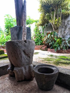 traditional mortar and pestle also called lumpang dan alu in indonesian