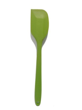 green plastic kitchen scoop on white background