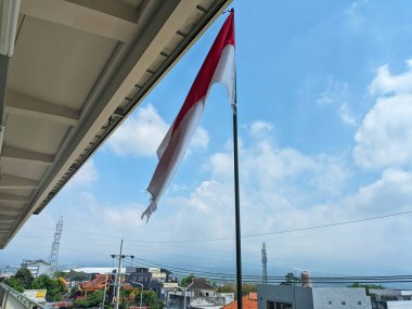 indonesian flag on the roof
