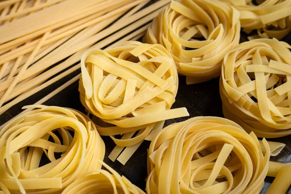 Pasta Shapes Spaghetti Tagliatelle Italian Cuisine Ingredients Wooden Background — Stock Photo, Image