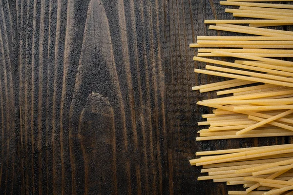 Raw Uncooked Spaghetti Italian Pasta Wooden Background — Stock Photo, Image