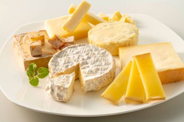 Assortment of fresh and delicious cheeses
