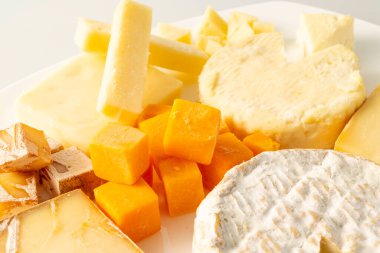 Assortment of fresh and delicious cheeses