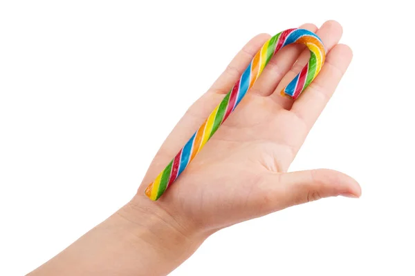 Hand Holds Striped Chocolate Wafer Rolls — Stock Photo, Image