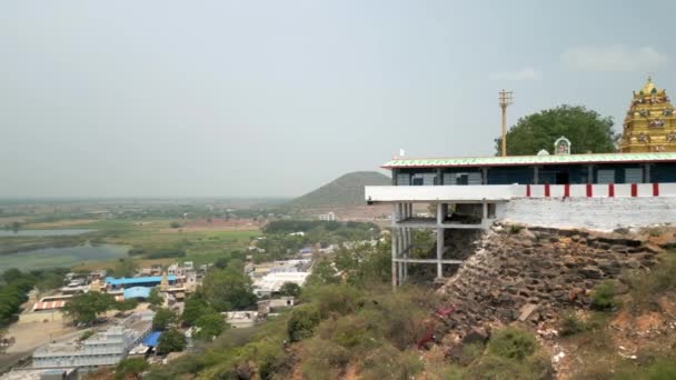 stock video Panorama view of a temple on a hill and a large lake in Southern India