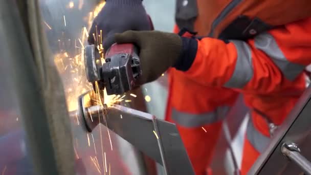 Close Worker Orange Uniform Hands Protective Gloves Cutting Bolt Glass — Stockvideo