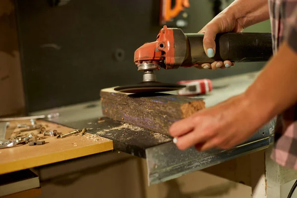 Close Worker Woman Hand Grinds Sanding Wood Workshop Restoring Antique — стоковое фото