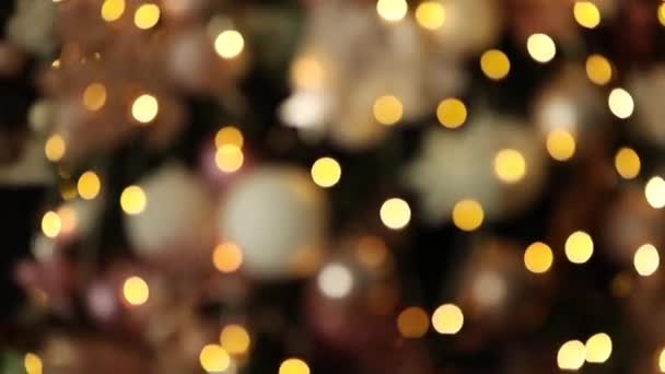 Oro Luci Sfondo Natale Con Albero Sfocato Decorato Illuminazione — Video Stock