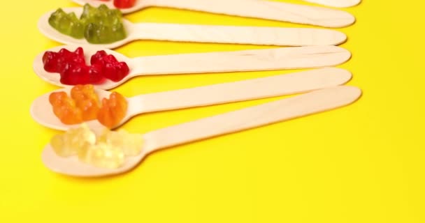 Rotation Composition Delicious Jelly Bears Candy Wooden Spoon Gummy Bear — Stock video