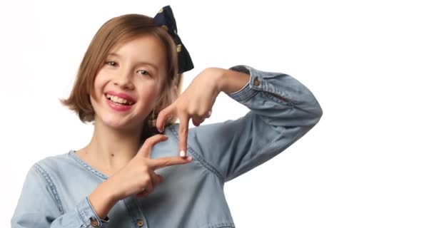 Smiling Little Girl Make Heart Sign Hands Casual Denim Dress — Stockvideo