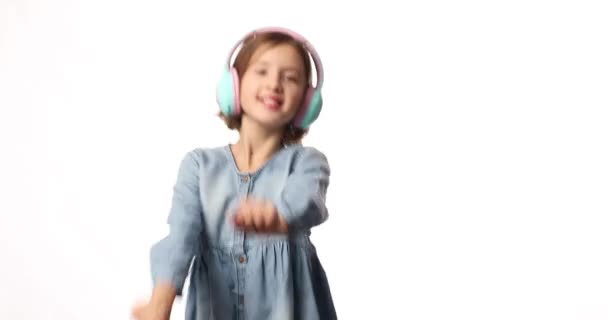 Girl Teenager Casual Denim Dress Listening Music Headphones White Background — Vídeo de Stock