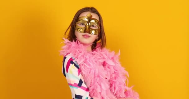 Joyful Teenager Girl Wearing Colorful Brazil Carnival Mask Posing Yellow — Stockvideo