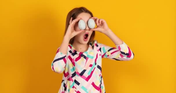 Happy Playful Teenager Girl Holding Painted Easter Eggs Covering Eyes — Wideo stockowe