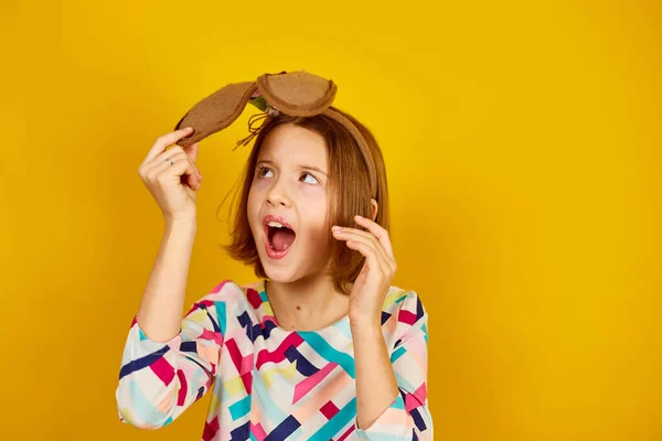 Happy Playful Teenager Girl Wearing Bunny Ears Bright Yellow Studio — Φωτογραφία Αρχείου