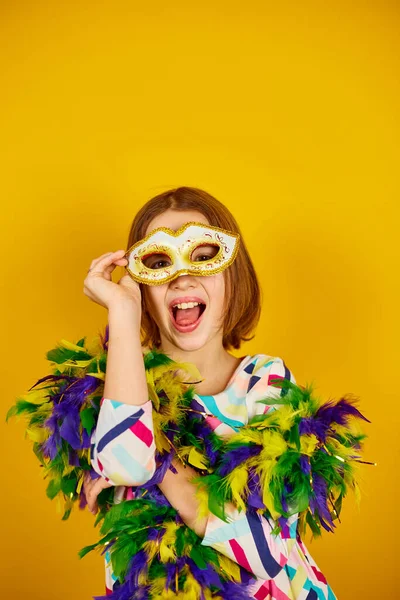 Joyful Teenager Girl Wearing Colorful Brazil Carnival Mask Posing Yellow Stockbild