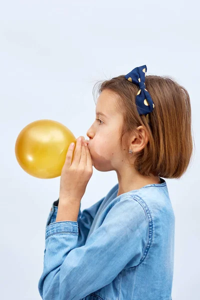Pretty Little Girl Casual Denim Dress Blowing Inflate Yellow Balloon — Photo