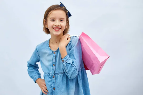 Pretty Child Girl Casual Denim Dress Hold Hand Pink Shopping — Zdjęcie stockowe