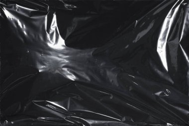 Plastik bir selofan dokuya sahip yüksek kaliteli JPEG. Benzersiz buruşuk ve şeffaf karakteri tasarımlara dokunsal bir boyut ekler. Modern şeffaf estetik için ideal.