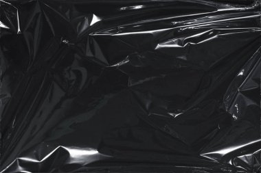 Plastik bir selofan dokuya sahip yüksek kaliteli JPEG. Benzersiz buruşuk ve şeffaf karakteri tasarımlara dokunsal bir boyut ekler. Modern şeffaf estetik için ideal.