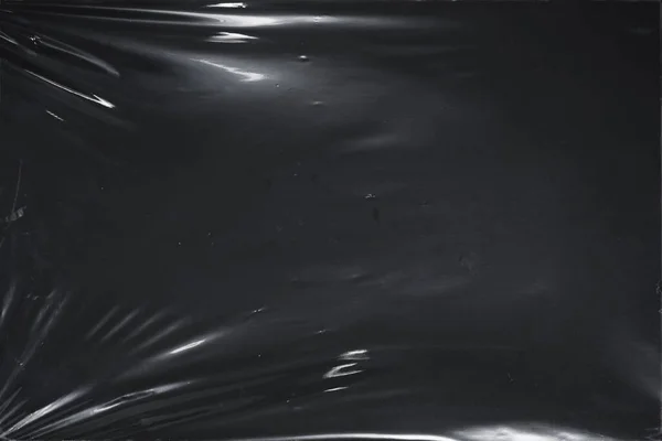 Plastik bir selofan dokuya sahip yüksek kaliteli JPEG. Benzersiz buruşuk ve şeffaf karakteri tasarımlara dokunsal bir boyut ekler. Modern şeffaf estetik için ideal.