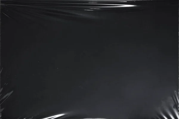 Plastik bir selofan dokuya sahip yüksek kaliteli JPEG. Benzersiz buruşuk ve şeffaf karakteri tasarımlara dokunsal bir boyut ekler. Modern şeffaf estetik için ideal.