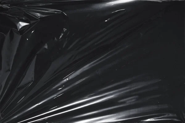 Plastik bir selofan dokuya sahip yüksek kaliteli JPEG. Benzersiz buruşuk ve şeffaf karakteri tasarımlara dokunsal bir boyut ekler. Modern şeffaf estetik için ideal.