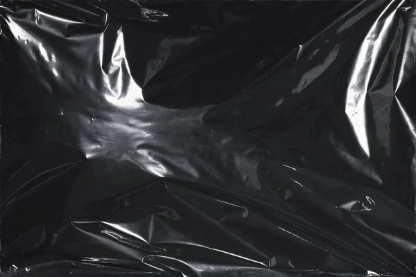 Plastik bir selofan dokuya sahip yüksek kaliteli JPEG. Benzersiz buruşuk ve şeffaf karakteri tasarımlara dokunsal bir boyut ekler. Modern şeffaf estetik için ideal.