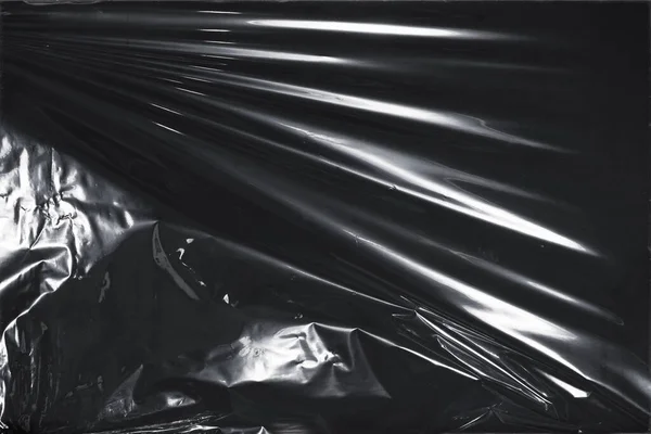 Plastik bir selofan dokuya sahip yüksek kaliteli JPEG. Benzersiz buruşuk ve şeffaf karakteri tasarımlara dokunsal bir boyut ekler. Modern şeffaf estetik için ideal.