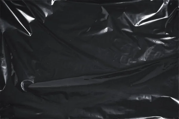 Plastik bir selofan dokuya sahip yüksek kaliteli JPEG. Benzersiz buruşuk ve şeffaf karakteri tasarımlara dokunsal bir boyut ekler. Modern şeffaf estetik için ideal.