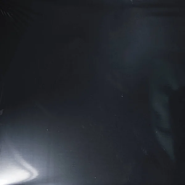 Plastik bir selofan dokuya sahip yüksek kaliteli JPEG. Benzersiz buruşuk ve şeffaf karakteri tasarımlara dokunsal bir boyut ekler. Modern şeffaf estetik için ideal.