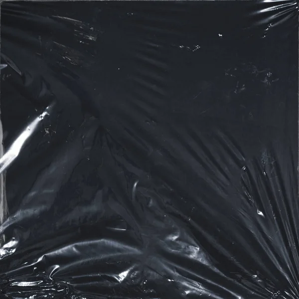 Plastik bir selofan dokuya sahip yüksek kaliteli JPEG. Benzersiz buruşuk ve şeffaf karakteri tasarımlara dokunsal bir boyut ekler. Modern şeffaf estetik için ideal.