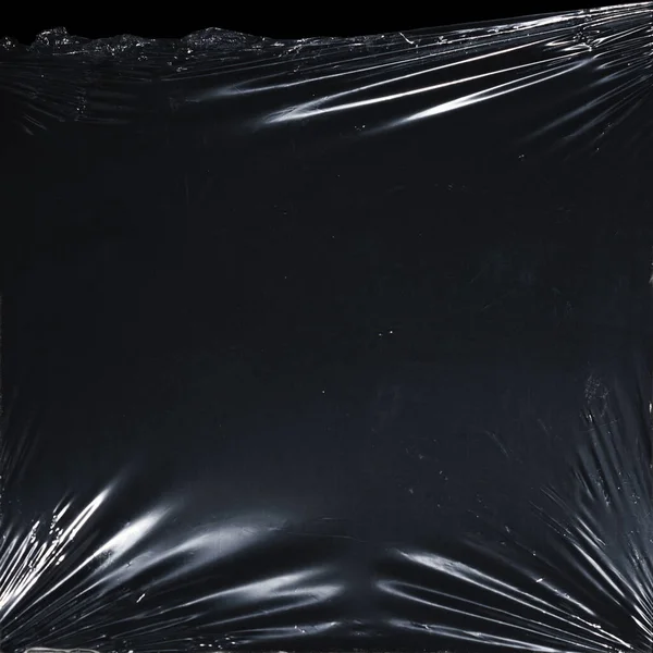 Plastik bir selofan dokuya sahip yüksek kaliteli JPEG. Benzersiz buruşuk ve şeffaf karakteri tasarımlara dokunsal bir boyut ekler. Modern şeffaf estetik için ideal.