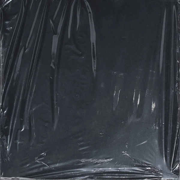 Plastik bir selofan dokuya sahip yüksek kaliteli JPEG. Benzersiz buruşuk ve şeffaf karakteri tasarımlara dokunsal bir boyut ekler. Modern şeffaf estetik için ideal.