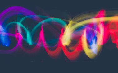 Soyut renkli düzensiz satır arkaplanı. Uzun pozlama. Hafif resim fotoğrafçılığı