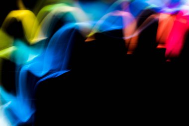 Soyut renkli düzensiz satır arkaplanı. Uzun pozlama. Hafif resim fotoğrafçılığı.