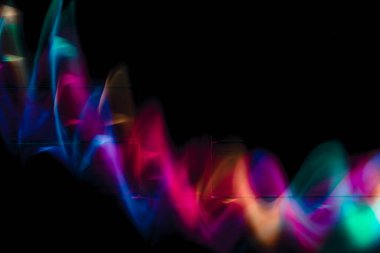 Soyut renkli düzensiz satır arkaplanı. Uzun pozlama. Hafif resim fotoğrafçılığı.