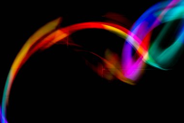 Soyut renkli düzensiz satır arkaplanı. Uzun pozlama. Hafif resim fotoğrafçılığı.