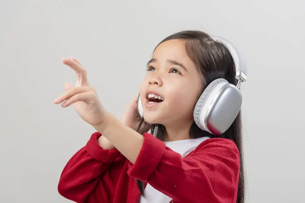 Lttle Girl Asia Cute Enjoying Her Music Headphones Isolated White — Stock Photo, Image