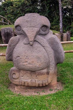Ancient religious monument and megalithic precolumbian sculpture in San Agustn Archaeological Park, Colombia, stone statues UNESCO WORLD HERITAGE. clipart