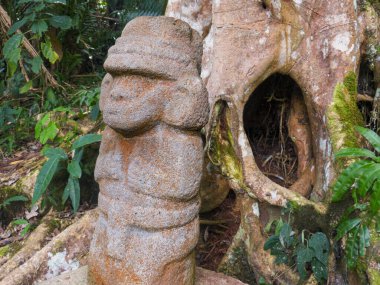 Ancient religious monument and megalithic precolumbian sculpture in San Agustn Archaeological Park, Colombia, stone statues UNESCO WORLD HERITAGE. clipart