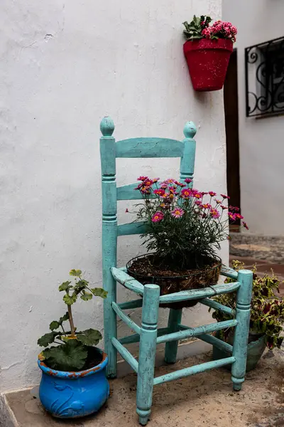 Charming Decorative Corner Frigiliana Vintage Turquoise Chair Vibrant Flower Pots — Stock Photo, Image