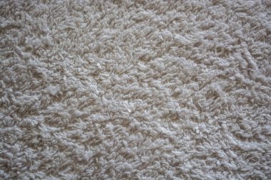 Machra 'nın beyaz örülmüş arka planı. Beyaz desenli arka plan. Beyaz kumaş.