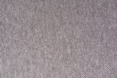 Arka plan açık gri örgü kumaş. Doku açık gri örgü kumaş