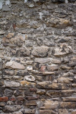 Taş duvar. Duvar dokusu. Geçmişi. Büyük ve küçük taşlardan oluşan duvar