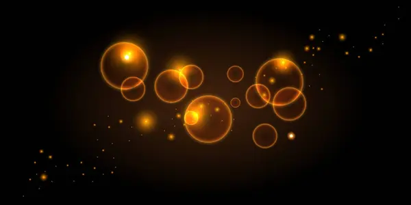 Koyu bir arka planda parlayan altın renkli ışık kabarcıkları ve parıltıları. Işıl ışıl, alevler ve bokeh etkisine sahip ışıl ışıl partiküller büyülü bir festival atmosferi yaratır. Tatil dekorasyonları, örtüler ya da parlak temalı soyut arka planlar için mükemmel.